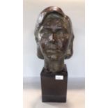 A good 20th century bronze bust sculpture of woman set within a square black slate/marble base, 50cm