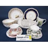 A collection of Wedgwood teawares with strawberry leaf and blossom decoration including milk jug,
