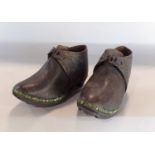 A pair of 19th century traditional north country child's clogs in timber and leather (unworn)