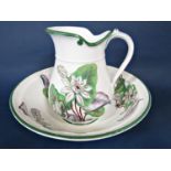 A 19th century New Stone China ewer and basin with printed and infilled waterlily decoration and