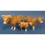 A family of three Beswick Limousin cattle comprising bull, cow and calf (3)