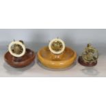 Set of three novelty brass nut crackers/small clamps, each fitted with a ships wheel over a curved