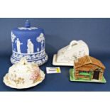 A large blue ground jasperware stilton dish and cover with classical figure detail and acorn knop,