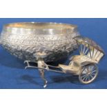 Indian white metal bonbon dish, embossed with scrolled foliate decoration, together with a further