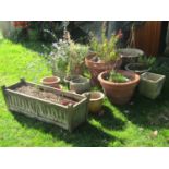 One lot of garden planters of varying size and design to include a wooden example of rectangular