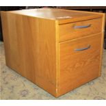 A modern oak veneered two drawer filing cabinet, 43 cm wide x 66 cm deep x 48 cm high