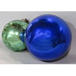 Two lustre glass witches balls, one in blue the other in green, the largest 30cm diameter (2) (af)