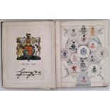 An early 20th century album containing a quantity of crest monograms and coats of arms, together