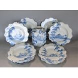 Collection of eleven hand painted plates in the 18th century Delft manner with individual building