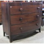 A substantial Victorian mahogany bow fronted chest of three long drawers together with a brush