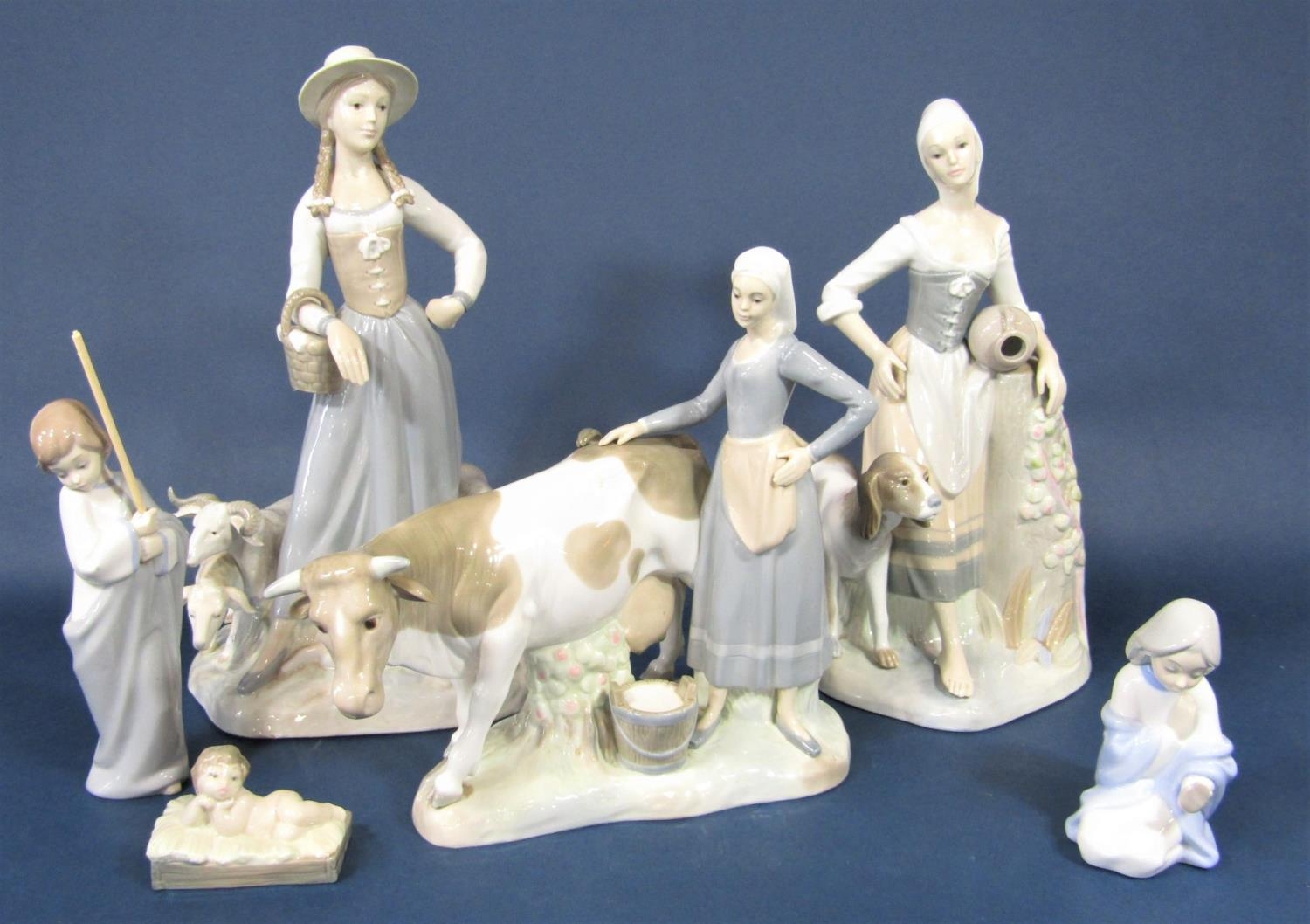 A collection of Spanish Zaphir ceramics in the Lladro style comprising a female shepherdess, 40cm