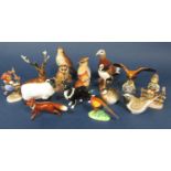 A collection of Beswick and other model animals and birds including a Beswick sheep, sheep dog, fox,