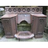 A 19th century cast iron fire grate with gothic tracery quatrefoil and lancet detail (incomplete