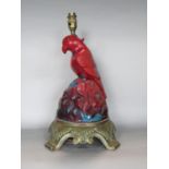 Unusual figural plaster and brass based table lamp in the form of a parrot with Tsang De Boeuf