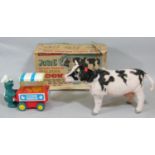 Vintage boxed toy 'Josie the Walking Cow' together with a battery operated Sesame Street 'Cookie