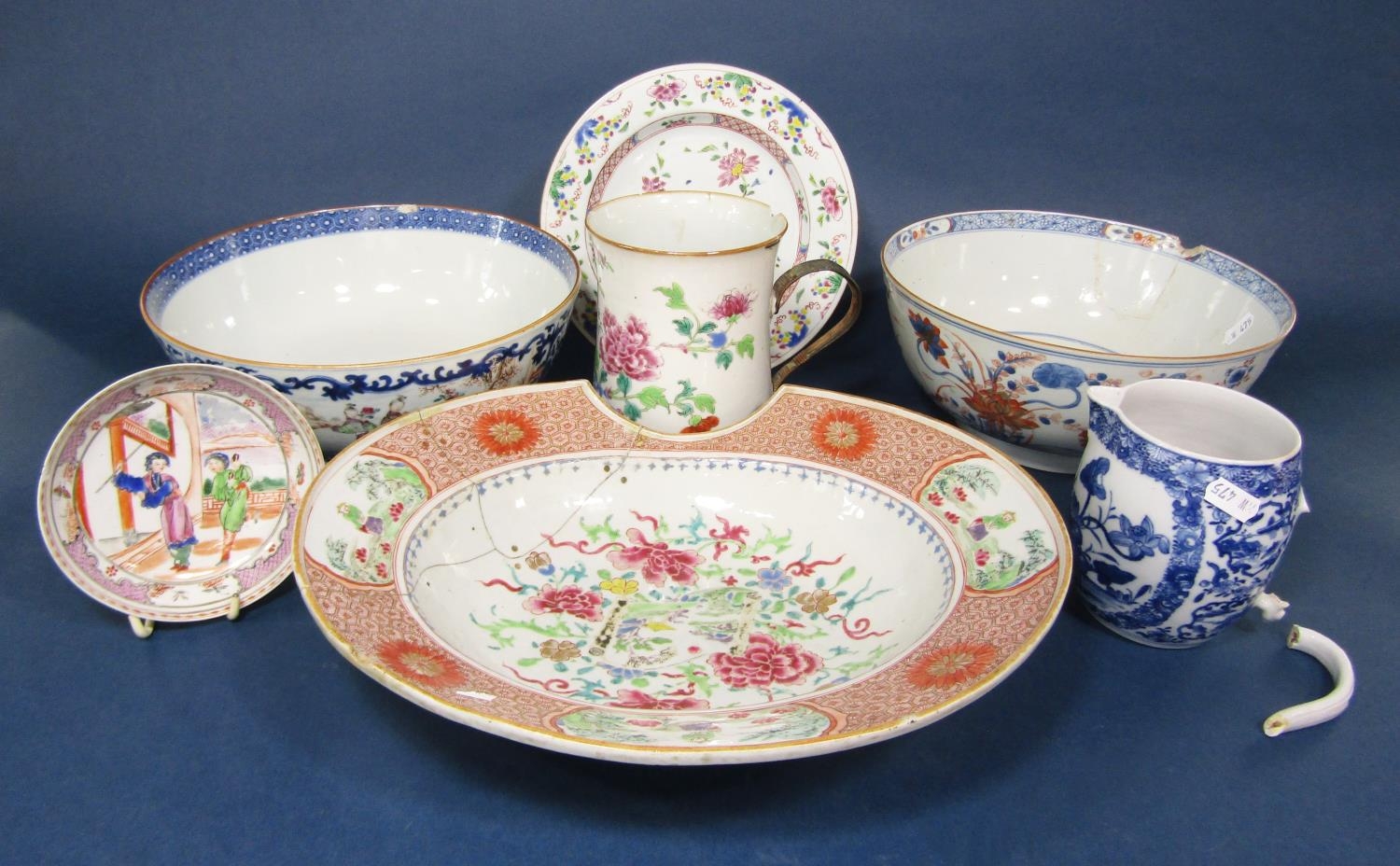 A collection of late 18th and early 19th century oriental ceramics including a Famille Rose barber's