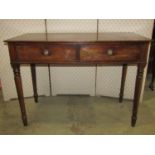 Mid Victorian period mahogany side table fitted with two frieze drawers on turned supports