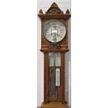 A good quality Admiral Fitzroy honey oak cased thermometer, with various inscribed ceramic panels,