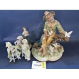 A collection of Capodimonte type figure groups, including The Man with Doves, by Cortese, 35cm