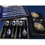 A mixed collection of silver comprising a cased white metal pair of salts and spoons, together