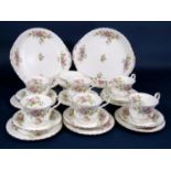 A collection of Royal Albert Moss Rose pattern teawares comprising pair of cake plates, sugar