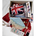 A box containing a mixed collection of war memorabilia to include a 1917 field dressing, a
