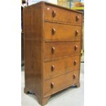 A Herbert Gibbs oak bedroom chest of five long slightly graduated drawers with moulded half ring