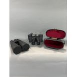 2 pairs of Japanese binoculars: one pair of 8x56 rubber protected and an 8x30 wide angle pair,