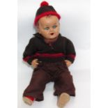 Unusual heavy, vintage character doll with head and bent limbs possibly metal or a hard composition,
