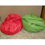 Two contemporary stitched soft leather bean bags in green and red colourways