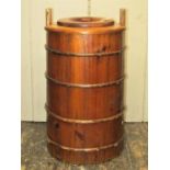 Chinese softwood barrel with banded detail, the lifting top securing a plastic bin by Chalon, 80cm