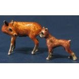 Two similar silver and enamel applied figures of standing animals to include a deer and a boxer dog,