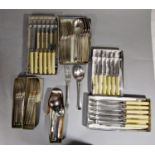 A large collection of various silver plated flatware