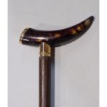 Malacca shafted slim walking cane with tortoise shell and yellow metal knop