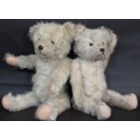 2 faded blue vintage teddy bears, both with jointed body, stitched nose and mouth and felt paw pads.