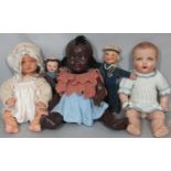 5 small vintage dolls including an unusual rubber headed baby doll by Kammer & Rheinhardt with