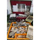 A large collection of silver plated flatware to include a part fitted canteen and others (a