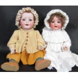 2 early 20th century German bisque head character dolls, both with a 5 piece bent limb composition