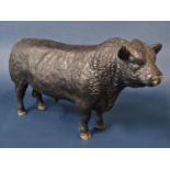 A Harper Shebeg Isle Of Man matt glazed studio pottery model of an Aberdeen Angus bull with