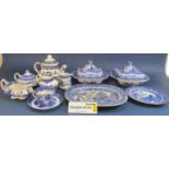 An extensive collection of 19th century and later blue and white printed Willow pattern wares of