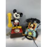 Two novelty Disney telephones of Mickey Mouse and Goofy