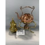 Mixed collection of metal ware comprising a copper and brass spirit kettle, trivet, toasting fork