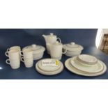 A quantity of Poole Pottery wares with speckled oatmeal coloured glaze and including pair of tureens