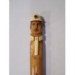 Novelty walking stick related to mining, knop carved with a gentleman wearing a mining helmet, the