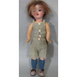 A small french bisque head doll by Jules Verlingue circa 1920's, with brown eyes, open mouth with