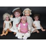A collection of 5 early 20th century German bisque head character dolls, all with composition bodies