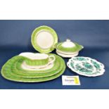 A collection of Ashworth Brothers ironstone dinnerwares with bright green and gilt border decoration