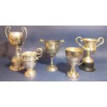 Five various silver plated twin handled trophies, the largest 38 cm tall, (5)