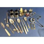A mixed collection of silver and silver plate comprising napkin ring, sugar nips, fruit knives, etc