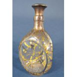 An unusual silver applied dimpled triform whiskey bottle, decorated with scrolled thistles, with